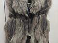 Меховая жилетка