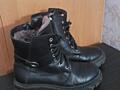 Продам зимние ботинки кожаные, на цинейке
