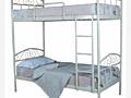 Продам двухъярусную железную кровать с матрасами