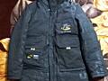 Продам зимнию куртку на мальчика на рост 140 см