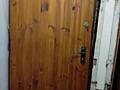 Дверь обшитая металлом и вагонкой деревянной с двух сторон