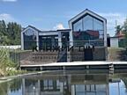 Пропонується до продажу сучасний будинок у стилі BarnHouse на першій .