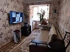 Продам 1 комнату в двухкомнатной квартире.